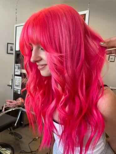 Woman  wearing red wig on the head