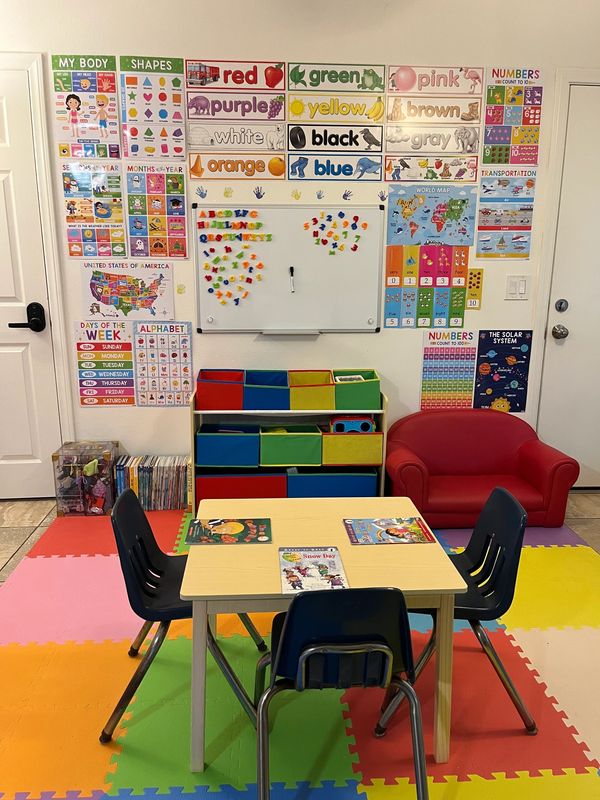 Well-organized classroom at Bear Beginnings Family Child Care for interactive learning.