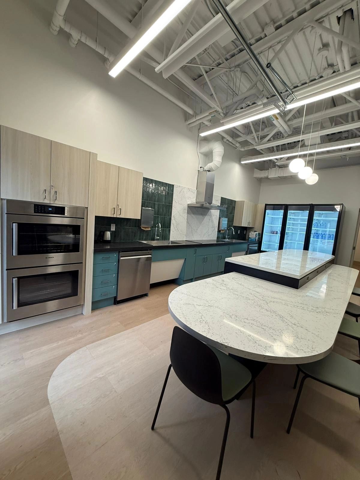 Commercial millwork installation featuring custom wood finishes in Vancouver, BC.