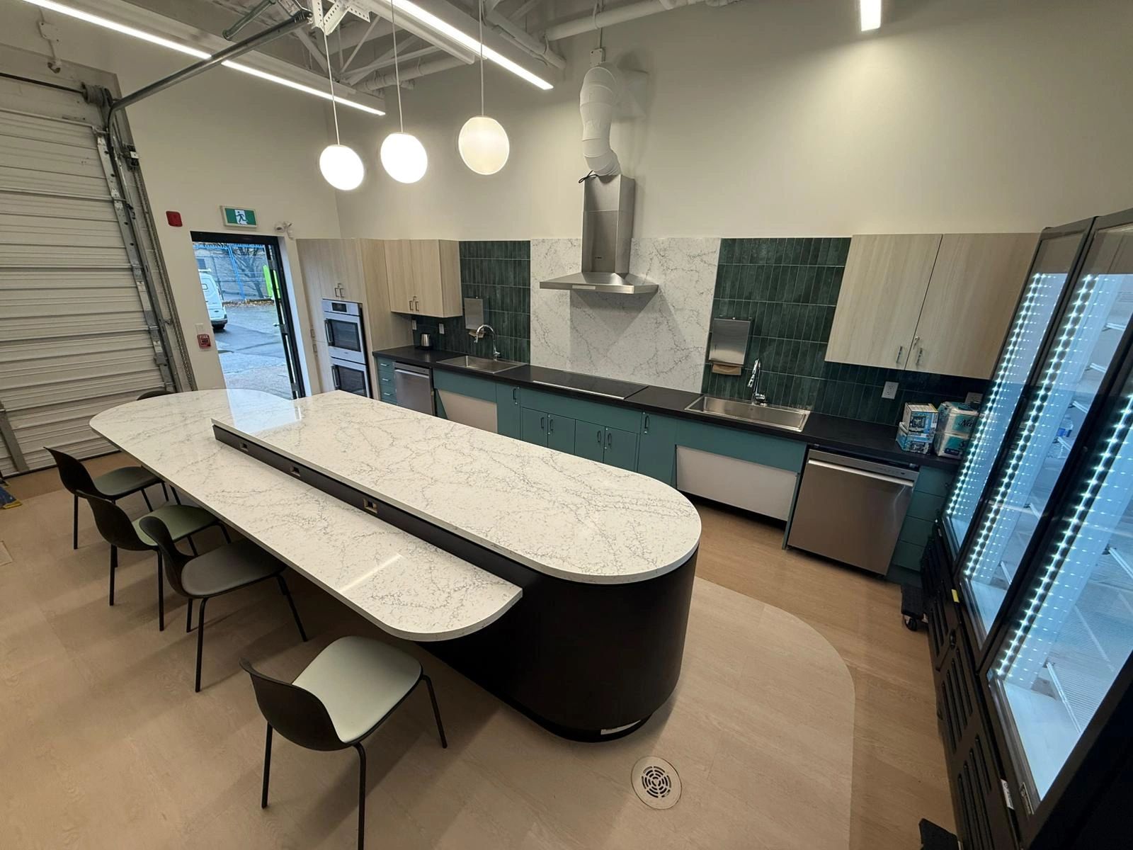 High-end retail millwork installation with custom cabinetry in Vancouver, BC.