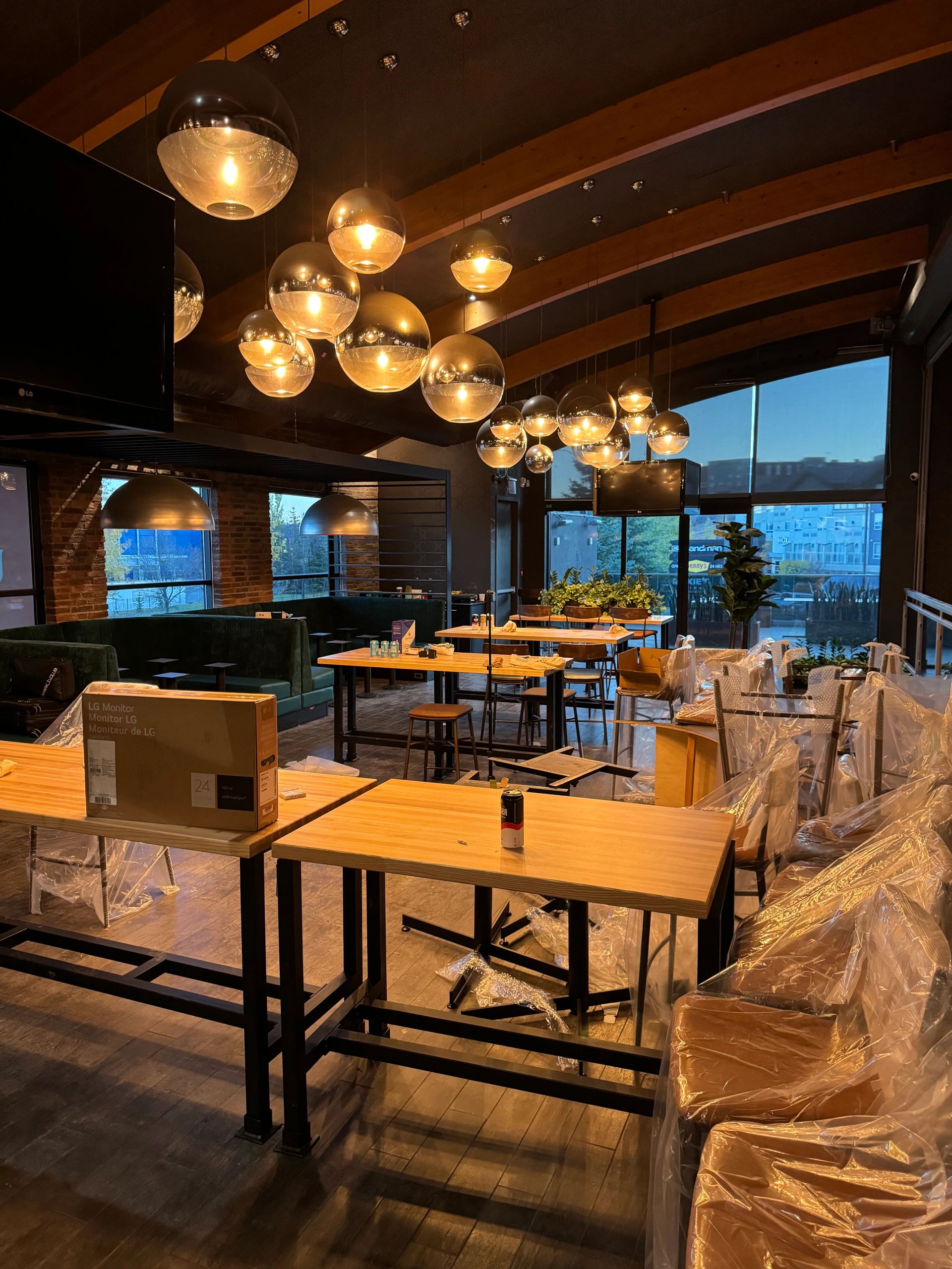 Custom millwork installation with wood wall panels and cabinetry in Calgary, AB.