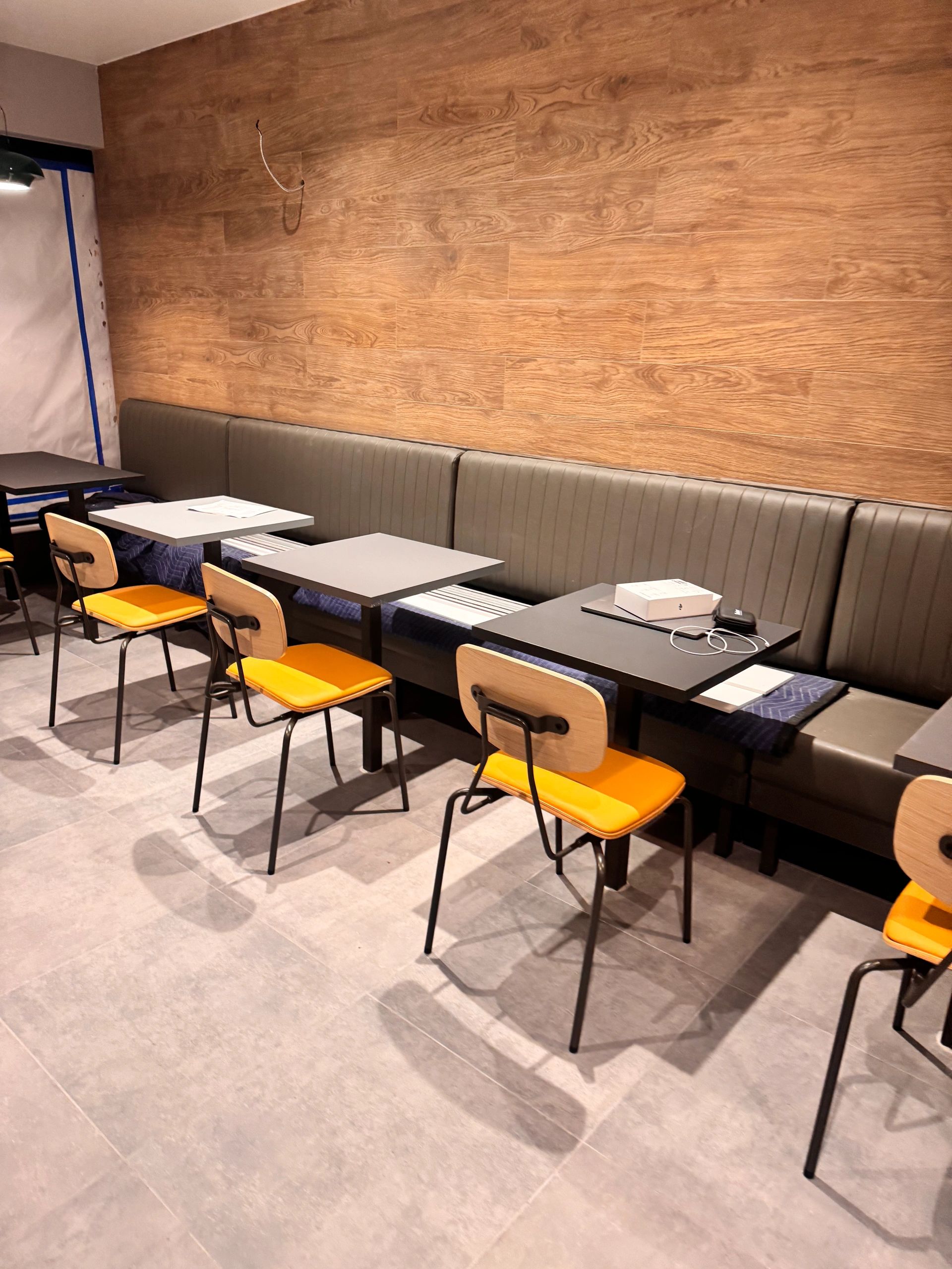 Commercial millwork installation featuring custom wood finishes in Vancouver