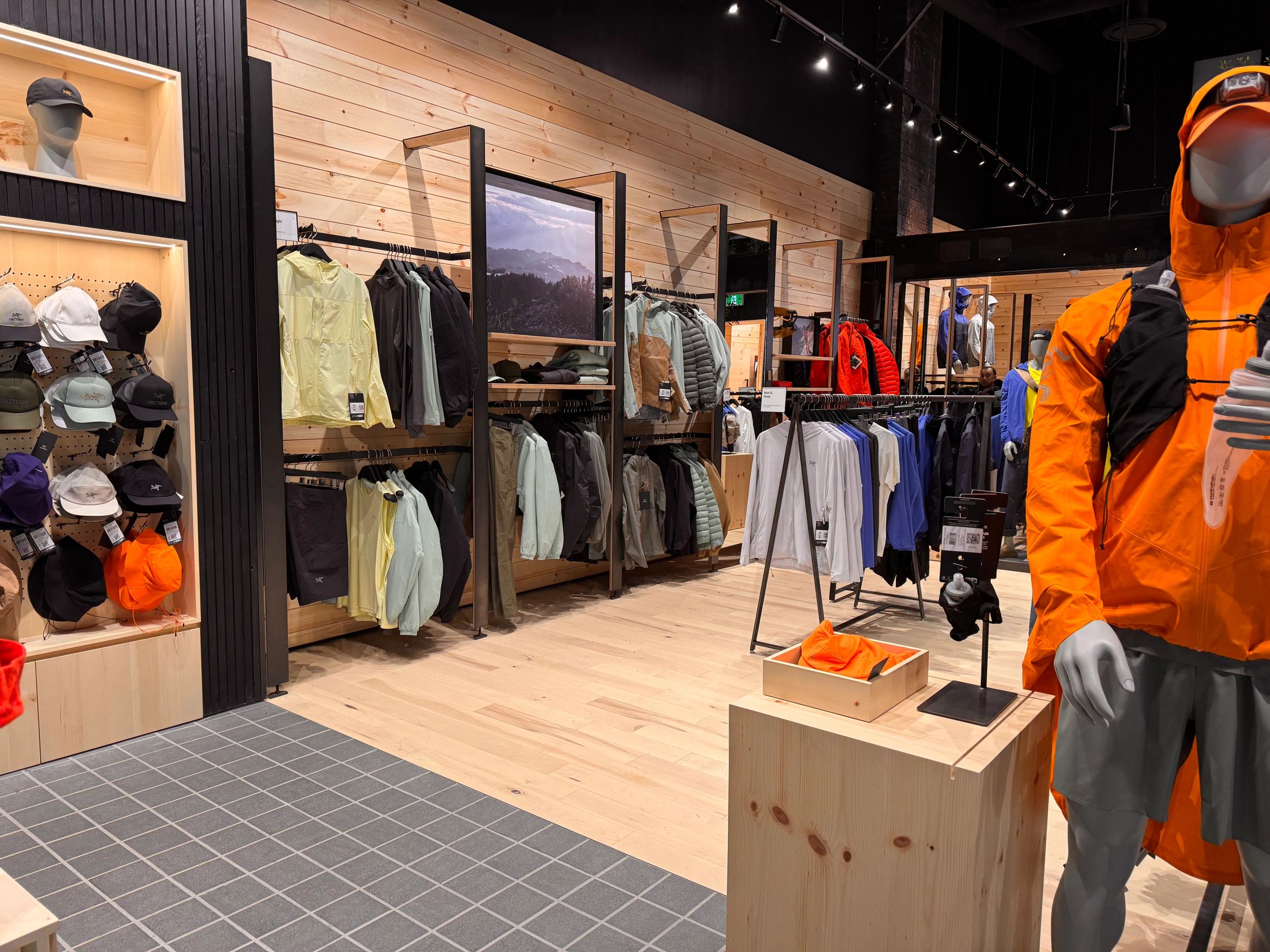 Retail millwork installation with display cabinetry and wood paneling in Banff, AB v
