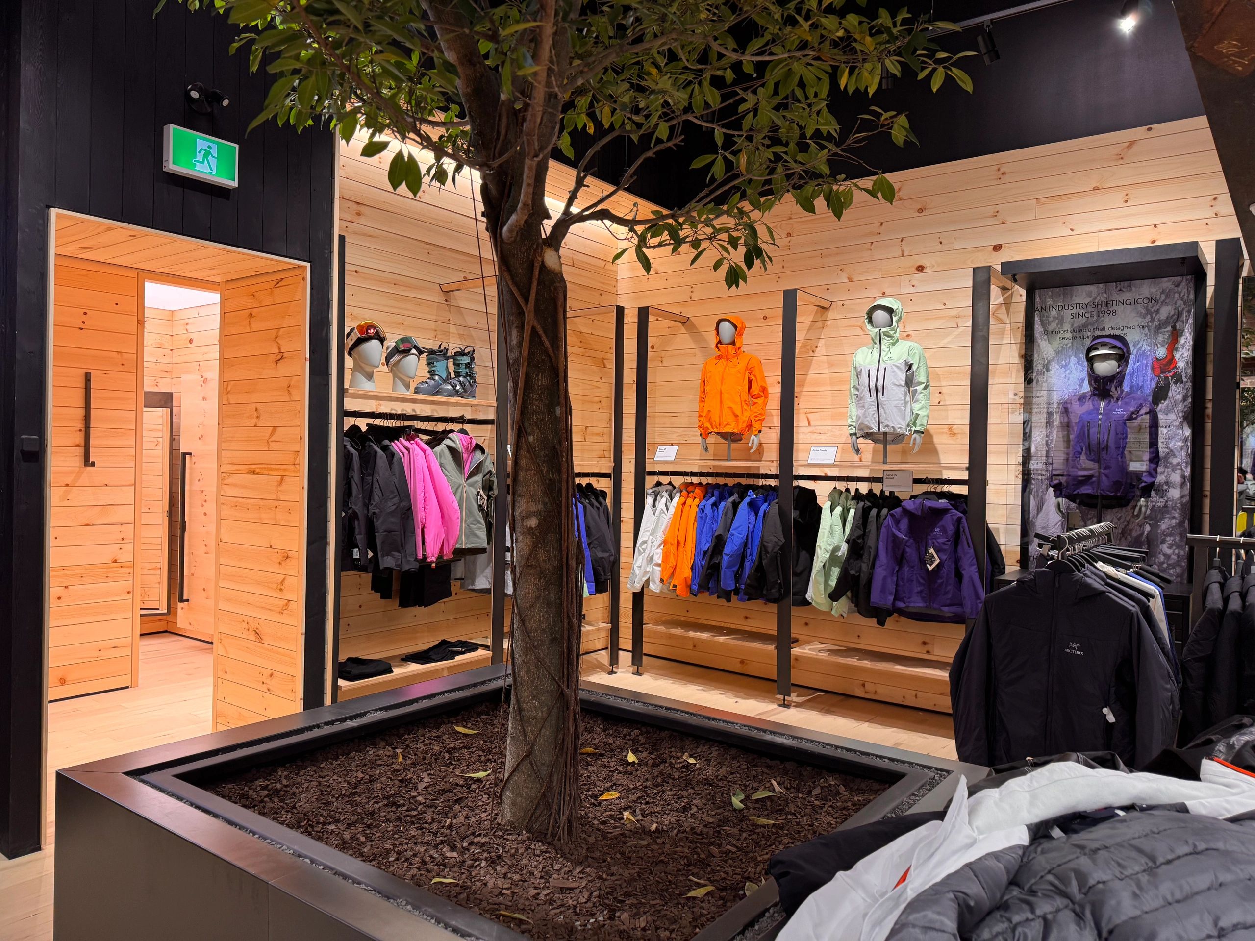 Custom millwork installation with wood wall panels and cabinetry in Banff, AB.