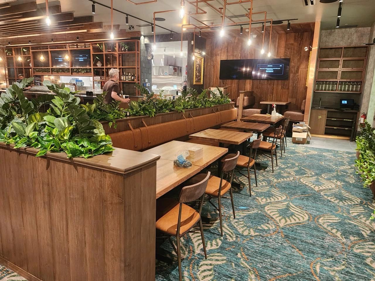 Commercial millwork installation featuring custom cabinetry and wood finishes in Winnipeg, MB.