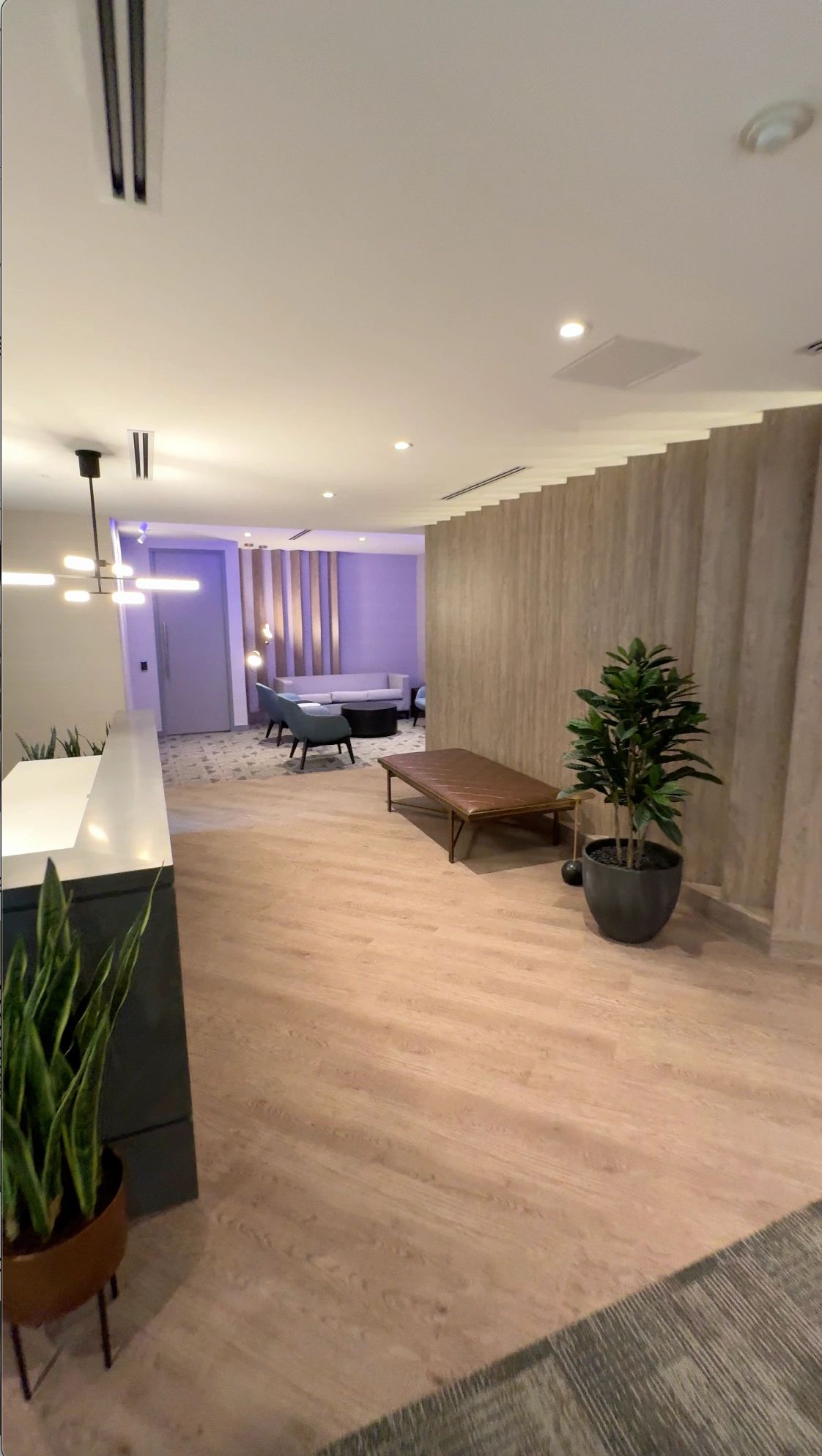 Custom millwork installation with cabinetry and wall panels in Vancouver, BC.
