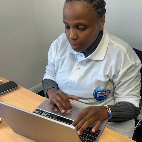 Women is working on the laptop