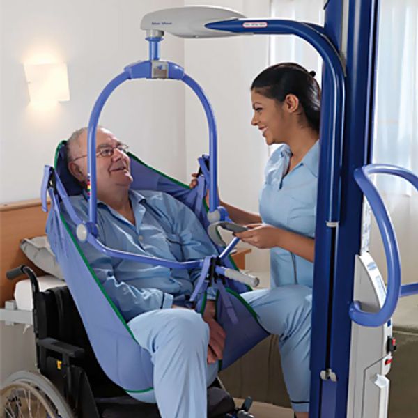 Caregiver gently supporting a senior man
