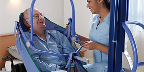 Senior man being cared for by a nurse