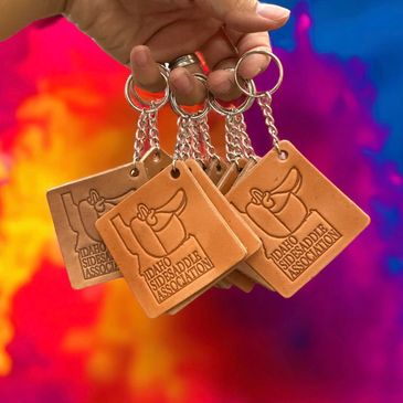 Leather keychains with Idaho Sidewinder Association logo.