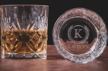 Whiskey glass with personalized coaster.