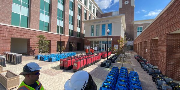 Equipment Rental ready to be unloaded on a job site