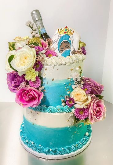Two-Tier Aquamarine Graduation Cake with Custom Cookie Topper and Mini Champagne Bottle