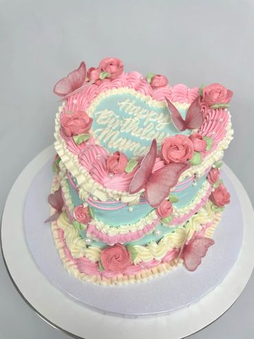 Classically Elegant Birthday Cake with Butterflies, Florals, and Rope Piping for Mom. 