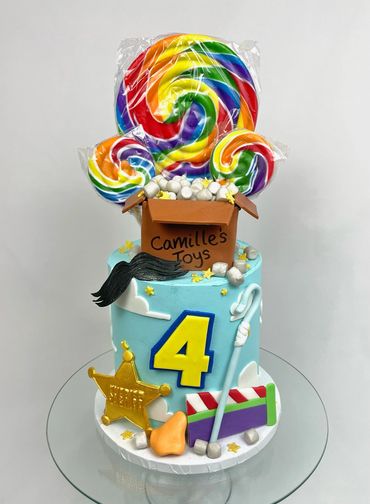 Cartoon Themed 4th Birthday Cake with for Toy Story. Woody, Buzz, and Friends. 