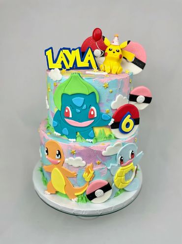 Cartoon Themed 6th Birthday Cake with Pikachu, Pokeball, Charmander and Friends.