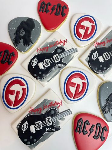 Rock and Roll Birthday Cookies with Guitar, and Guitar Picks from popular bands. 