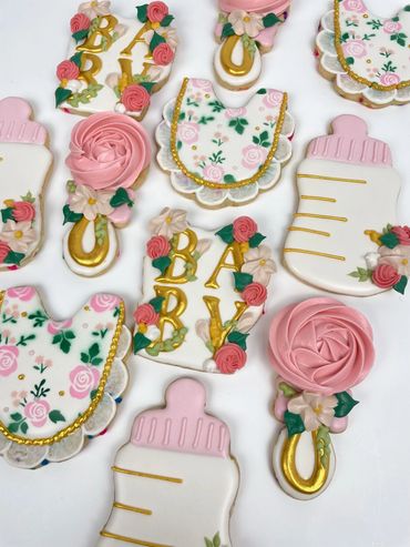 Floral and Gold Baby Shower Cookies with Floral Rattle. Bibb, and Bottle. 