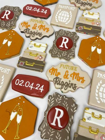 Fall Colored Wedding Shower Cookies with a Travel Theme. Champagne Glasses, Suitcases and Passports.