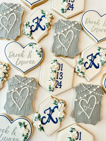 Wedding cookies with Blues, Grey, and White. Flower borders, with wooden effect and couples initials