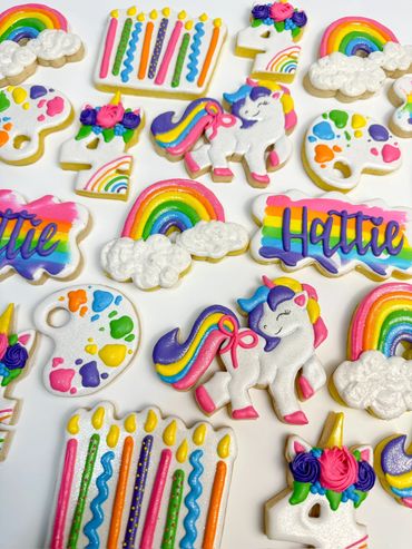 Unicorn Paint Party Birthday Cookies with Happy Unicorns, Paint Palettes, Rainbows, and Number 4.