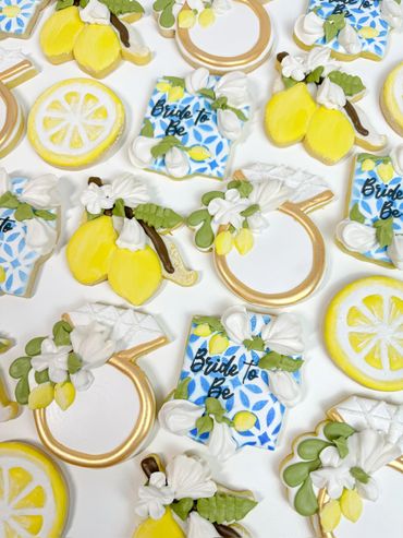 Amalfi Coast Inspired Wedding Shower Cookies with Rings, Lemons, and Lemon Flowers. Blues and Yellow