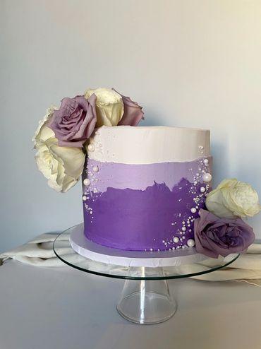 Purple Layer Birthday Cake with Candy Pearls and Real Flowers