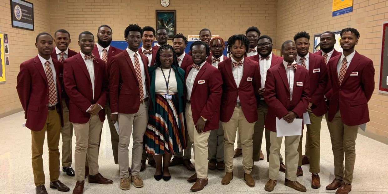 Pictured here with Claflin University Call Me Mister who student taught in the STEAM Academy