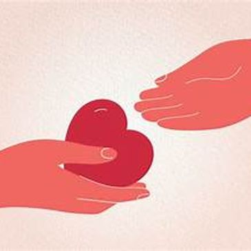 One hand offering a red heart to another hand.