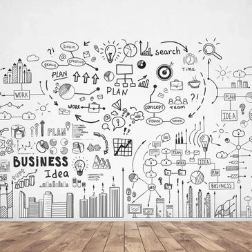 Wall covered with business and idea sketches.