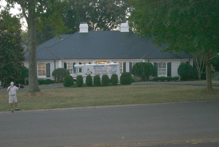 Asbestos roof with new color coating by Asbestos -One, a division of Mr. Clean Pressure Washing. 