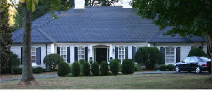 Asbestos roof  afer color coating  by Asbestos -One, a division of Mr. Clean Pressure Washing. 