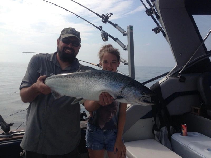 Captain Kris McHugh with a Lake Michigan catch