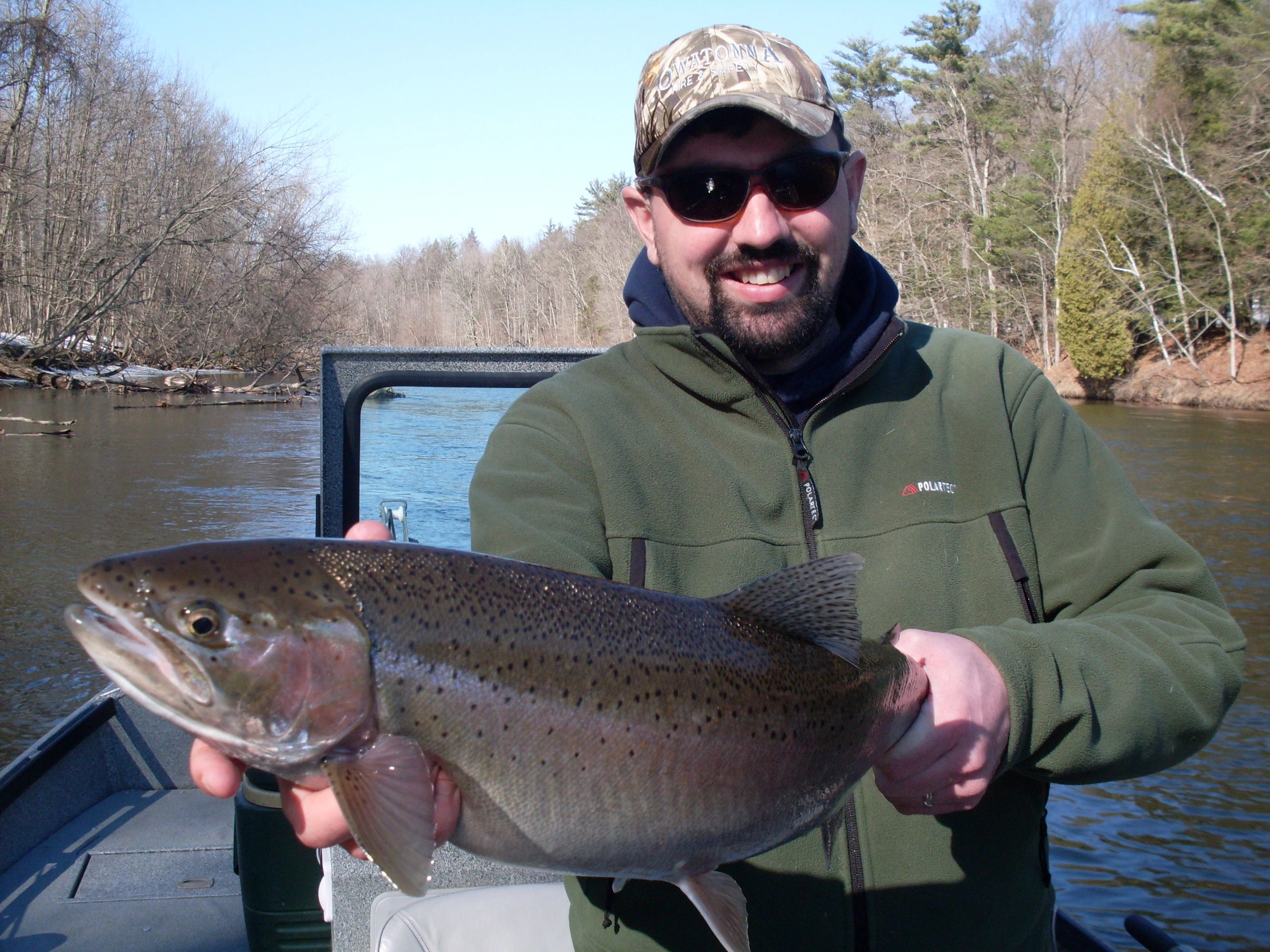 Muskegon River guide Kris McHugh with a Muskegon River Steelhead