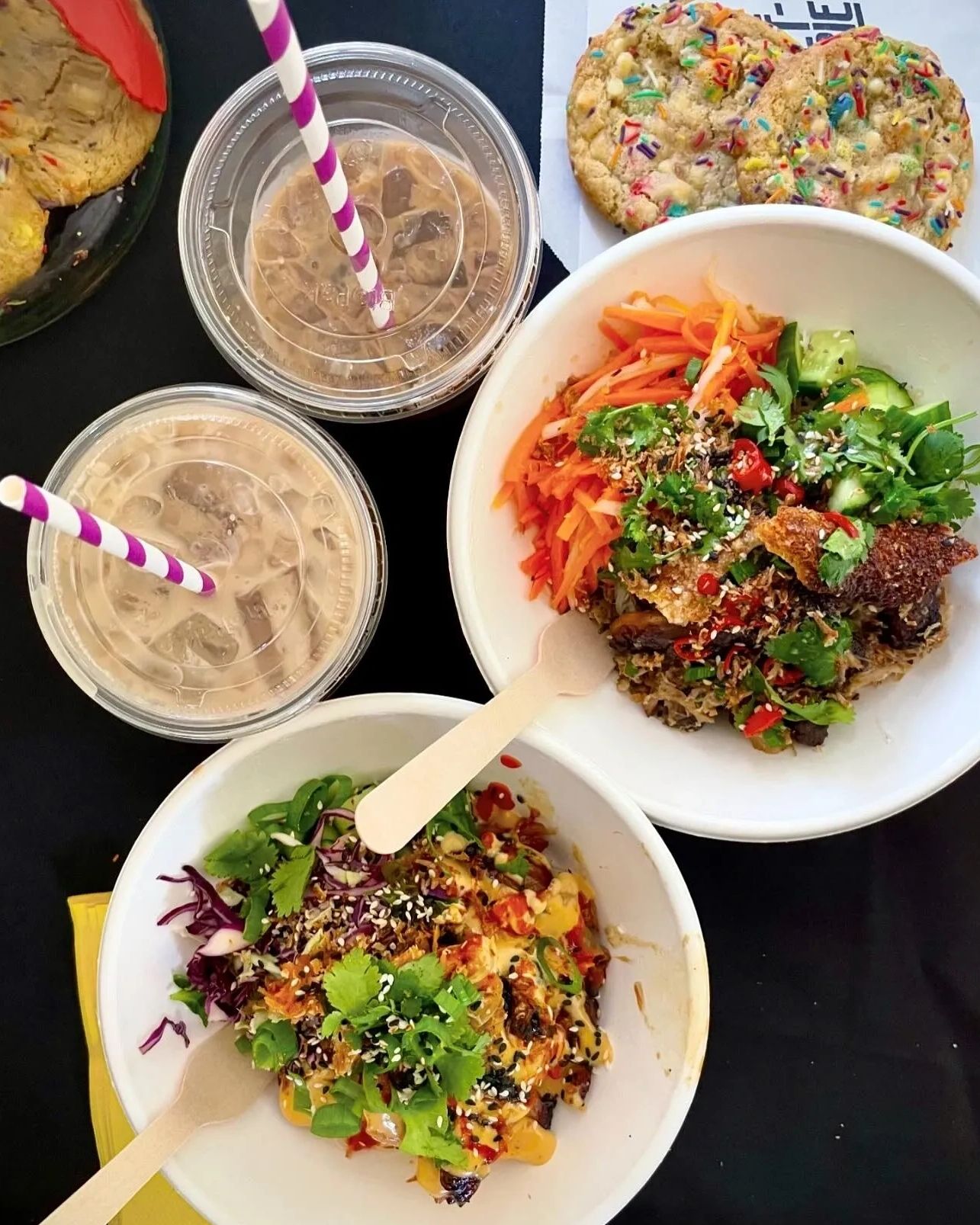 The Streeterie'sBanh Mi Noodle bowl and Korean Chicken noodle salad with iced chai drinks and cookie 