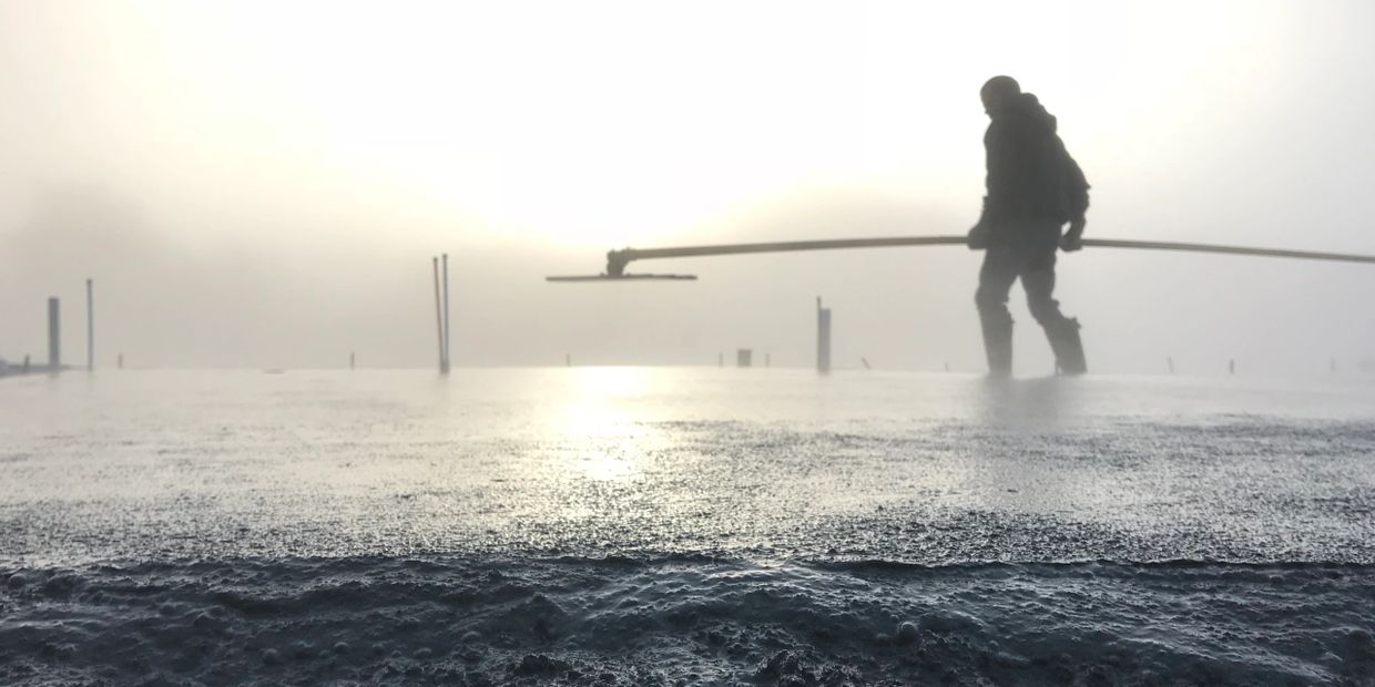 Bull float being used in fog by North Bend NE