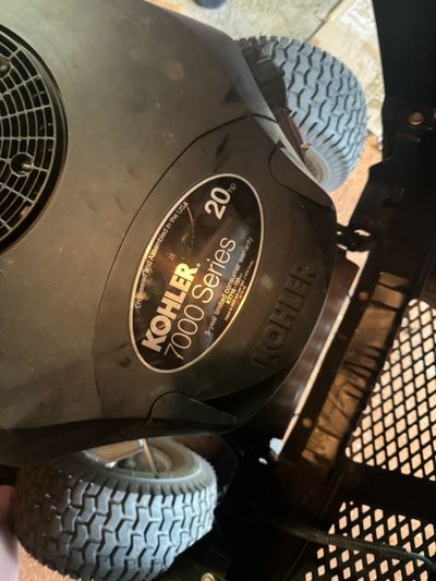 Close-up of Kohler 7000 Series 20 HP engine on a lawn tractor.