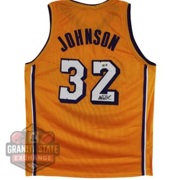 Autographed yellow basketball jersey with the name Johnson and number 32.