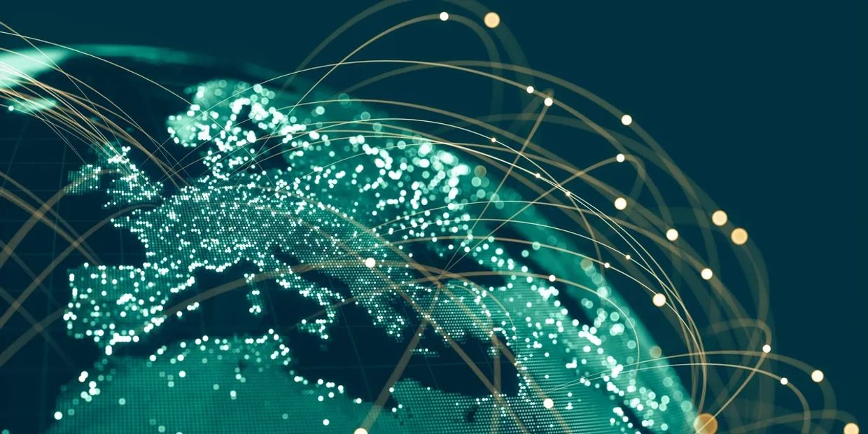 Digital map of Europe showing global network connections with glowing points and arcs.