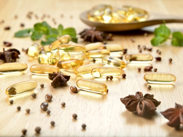 medicinal pills on a wooden counter