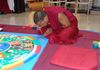 At the New Albany Art Museum, a group of Tibetan Monks created a floor sand sculpture called a "MANDALA" to promote COMPASSION in the world - Amazing!