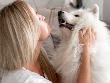 pet owner with family dog