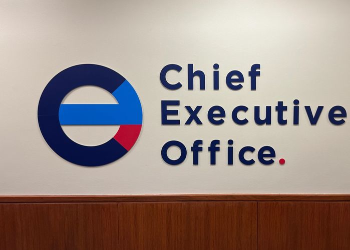 Dimensional acrylic signage for modern institutional office with durable professional presentation.
