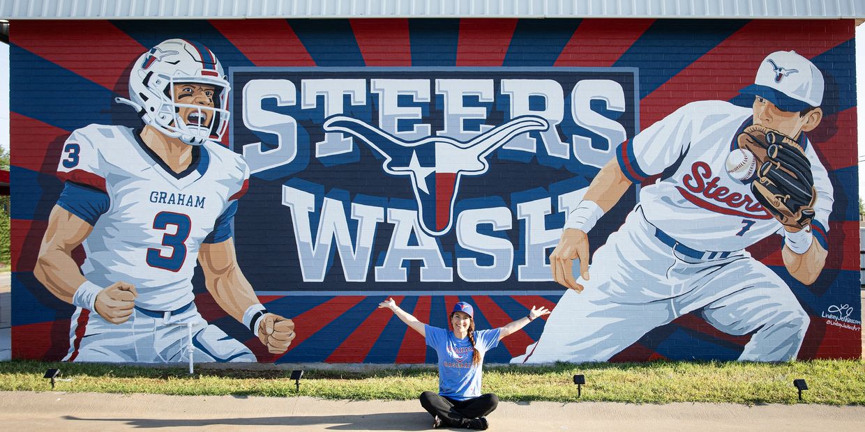 A mural showcasing Graham Steers football and baseball players with a fan sitting in front.