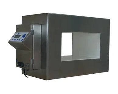 A stainless steel industrial machine with a control panel and a large rectangular opening.