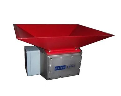 Red and gray industrial device with a funnel-shaped top.