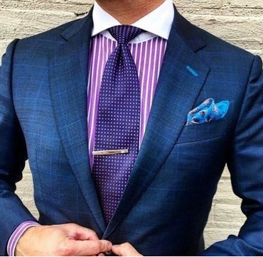 Men's custom made blue suit with custom made striped dress shirt purple tie with tie bar blue hankie