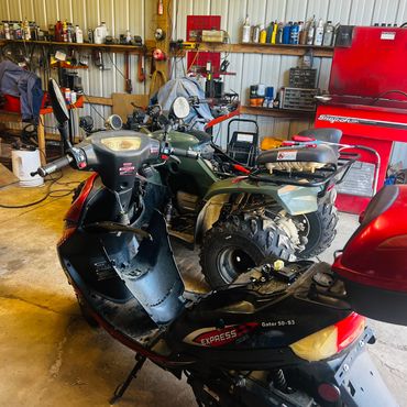 Four-wheeler and scooter on deck