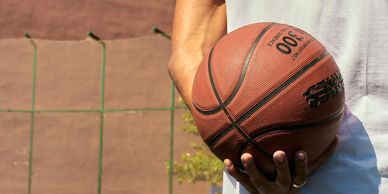 Man holding basketball close up