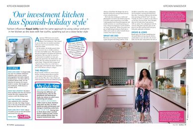 Pink kitchen with patterned tiles and a lady in patterned skirt